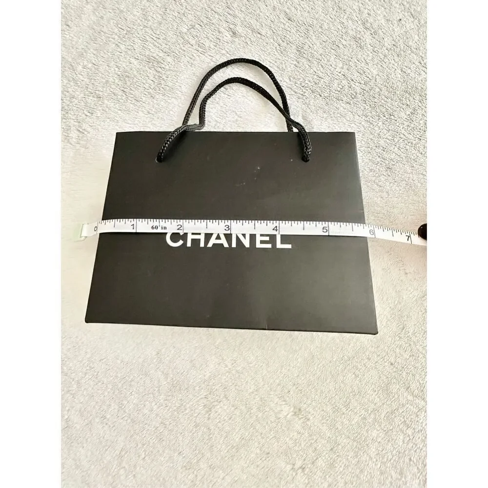Small black Chanel gift bag ￼